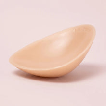 Close-up of The Sculpt insert showing the tapered edge and the adhesive face